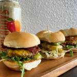 The picture with the 3 burgers and a can is their Spanaway location (there was no comment on who to give credit for this picture) and I asked verbally initially and via an email for her to send the pics. & menu to.