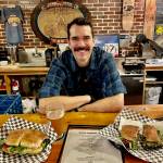 Tom Gibbon, owner of tom's sandwich co. Photo by Kelly Reehorn