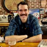 Tom Gibbon, owner of tom's sandwich co. Photo by Kelly Reehorn