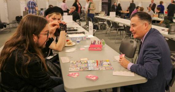 Washington Secretary of State Steve Hobbs, right, seen here at a game night event in February 2024, at the state Capitol in Olympia, will travel to Japan on a trip to promote economic ties between the country and Washington state, including in the tabletop gaming sector. (Secretary of States Office)