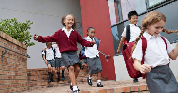 Children at modern school facility. (Getty Images)