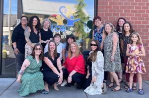 Photo courtesy of Alisha Vilela 
Alisha Vilela, center, outside A Place for Me in Tacoma.