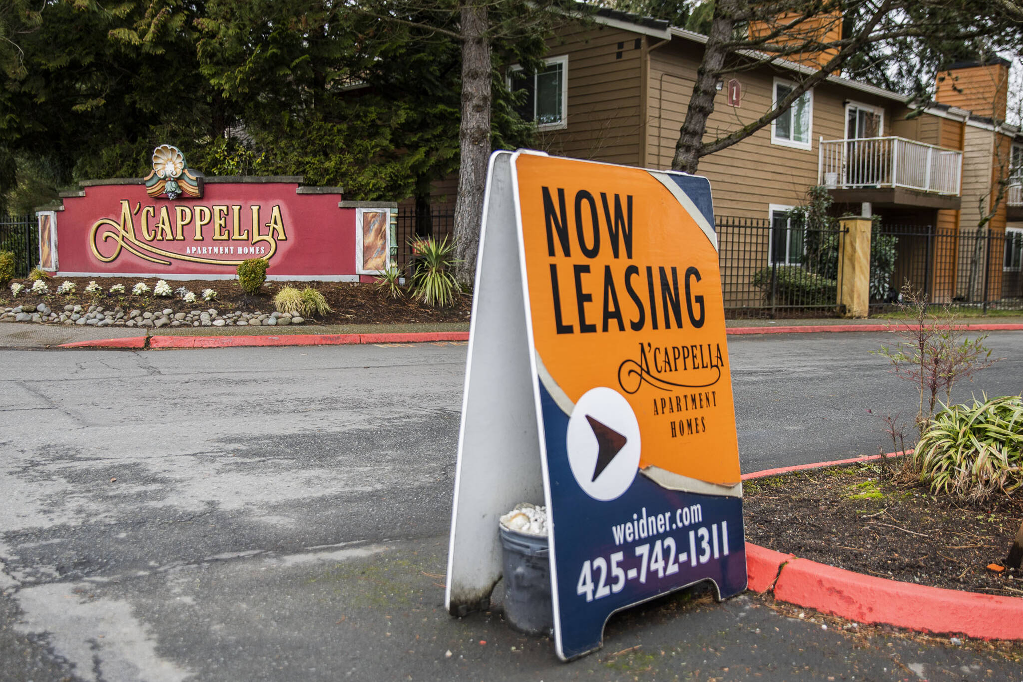 Sound Publishing file photo
A leasing sign in visible outside of Acappella Apartment Homes last year in Everett, Washington.