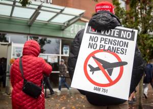 Olivia Vanni / Sound Publishing
Larry Best, a customer coordinator for quality assurance who has worked at Boeing for 38 years, stands outside of Angel of the Winds Arena with a vote no sign on Monday in Everett.