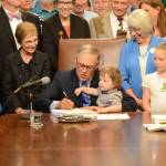 Office of the Governor 
Gov. Jay Inslee signs legislation in 2017 creating the Department of Children, Youth and Families.