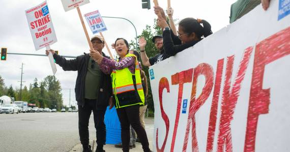 Striking workers typically are not eligible for unemployment benefits in Washington. A bill state lawmakers are considering this legislative session would change that. Here, Boeing machinists are seen during their 2024 strike that stretched nearly two months. (Ryan Berry)