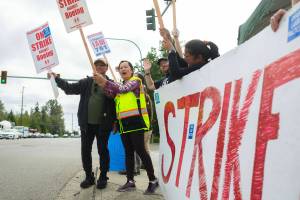 Striking workers typically are not eligible for unemployment benefits in Washington. A bill state lawmakers are considering this legislative session would change that. Here, Boeing machinists are seen during their 2024 strike that stretched nearly two months. (Ryan Berry)