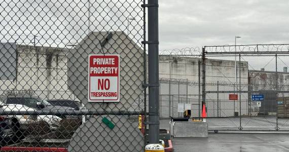 A no trespassing sign outside of the Northwest ICE Processing Center in Tacoma. (Grace Deng/Washington State Standard)