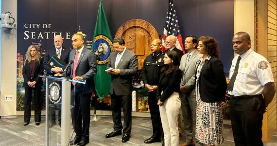 Washington state Attorney General Nick Brown speaks at a press conference alongside Seattle Mayor Bruce Harrell and other local officials on Monday, Sept. 29 at Seattle City Hall. (Photo by Jake Goldstein-Street/Washington State Standard)