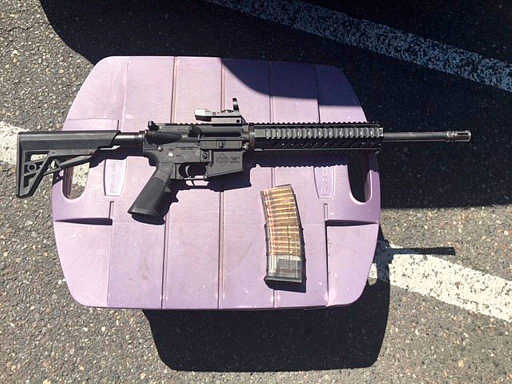 An AR-15 rifle and a loaded magazine that were recovered from a suspect in a shooting incident at the Kent Station parking garage in 2019. (Photo courtesy of King County Sheriffs Office)