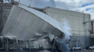The burst white liquor tank is seen at the Nippon Dynawave Packaging facility in Longview, Washington, on May 26, 2026. (Photo courtesy of Longview Fire Department)